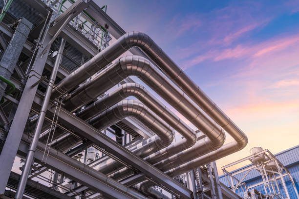 pipeline of oil and gas at industry zone.The pipe of factory ,Close-up of industrial steel pipelines at oil-refinery plant and sky